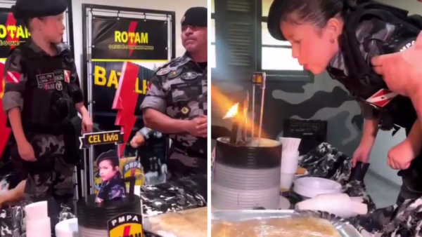 Criança de 7 anos com roupas militares comemorando aniversário e assoprando um bolo