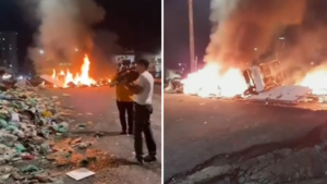 Grande quantidade de lixo sendo incendiado em uma rua de Belém