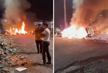 Grande quantidade de lixo sendo incendiado em uma rua de Belém