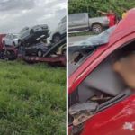 Acidente envolvendo um carro vermelho e um caminhão cegonha, que contém vários veículos