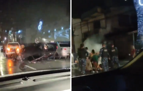 Vídeo mostrando um carro capotado e uma briga entre guardas municipais e jovens que estavam em uma rua