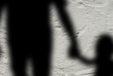 Sombra de homem com uma criança