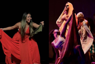 Ator e atriz em apresentação no teatro.