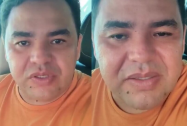 Empresário falando em frente a câmera