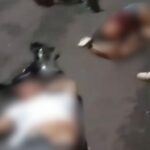 duas pessoas caídas ao chão. Imagens embaçadas devido serem fortes