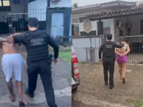 dois presos sendo conduzidos para a delegacia