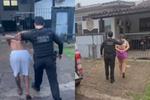 dois presos sendo conduzidos para a delegacia