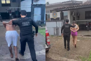 dois presos sendo conduzidos para a delegacia