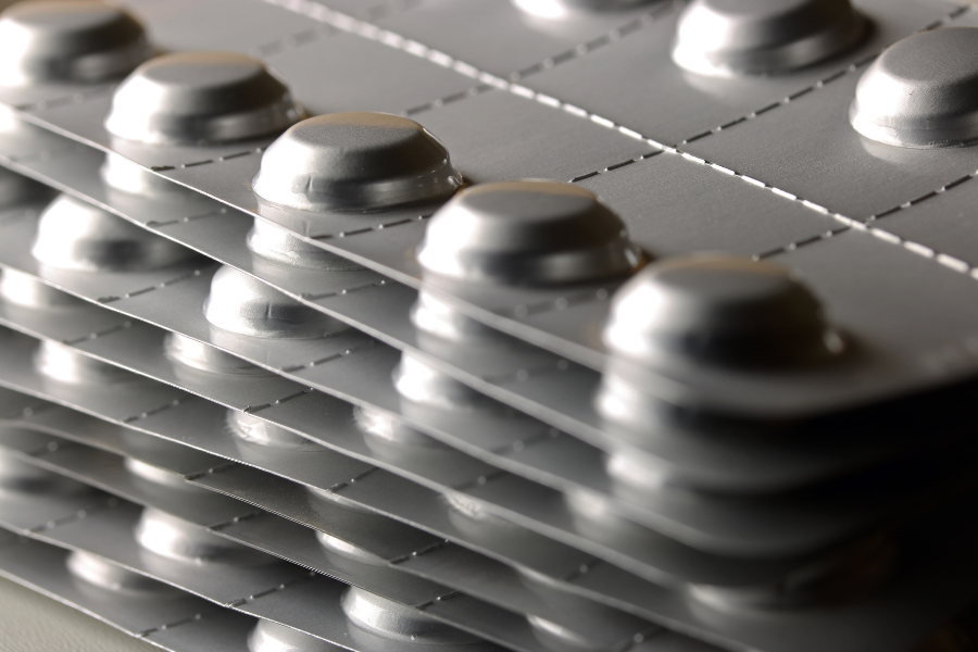 Imagem ilustrativa de cartelas de comprimidos.