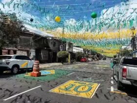 Moradores da Cremação transformaram a Travessa Três de Maio com pinturas e bandeirinhas em homenagem à Seleção Brasileira.
