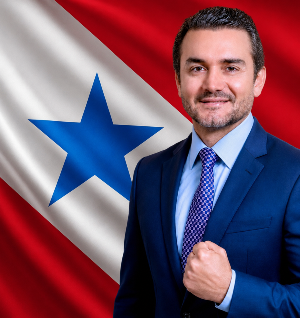 Foto de Celso Sabino com a foto da bandeira do Pará ao fundo